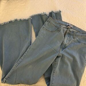 Judy Blue Light Denim Flare Jeans with Frayed Hem